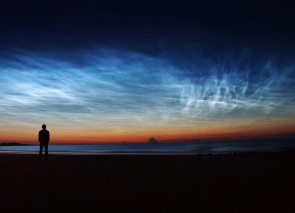 Matt Robinson in Sunderland, U.K., saw this wonderful, electric-blue noctilucent clouds on July 7, 2014.  They are sometimes called night-shining clouds.  